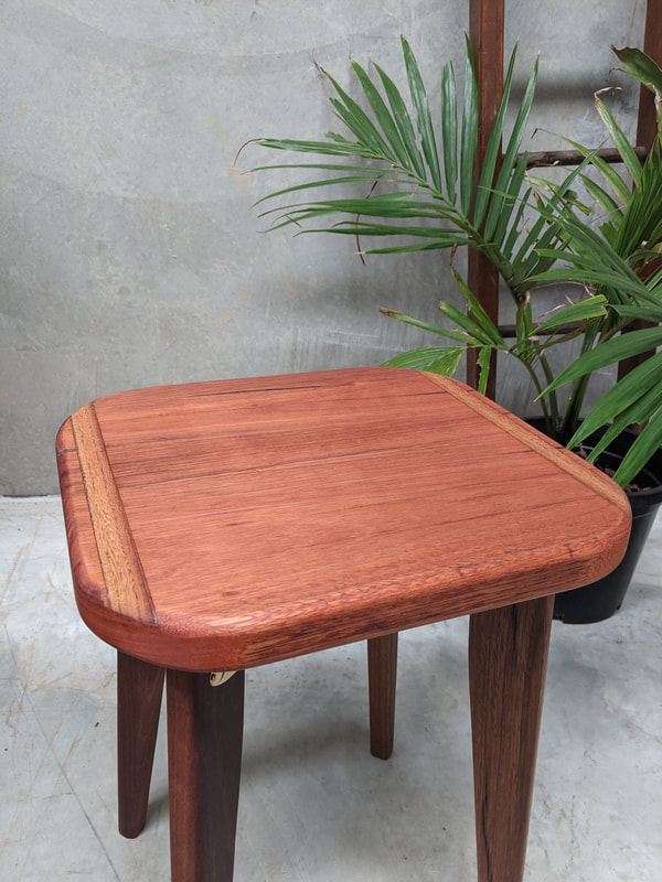 Side tables made from spotted gum with inlay